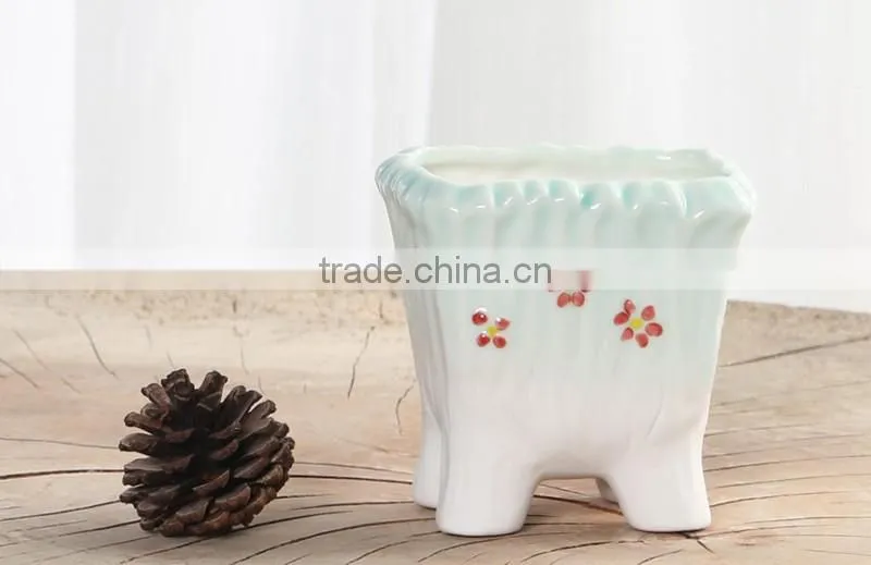 Cute handmade small blue indoor ceramic planters for succulents