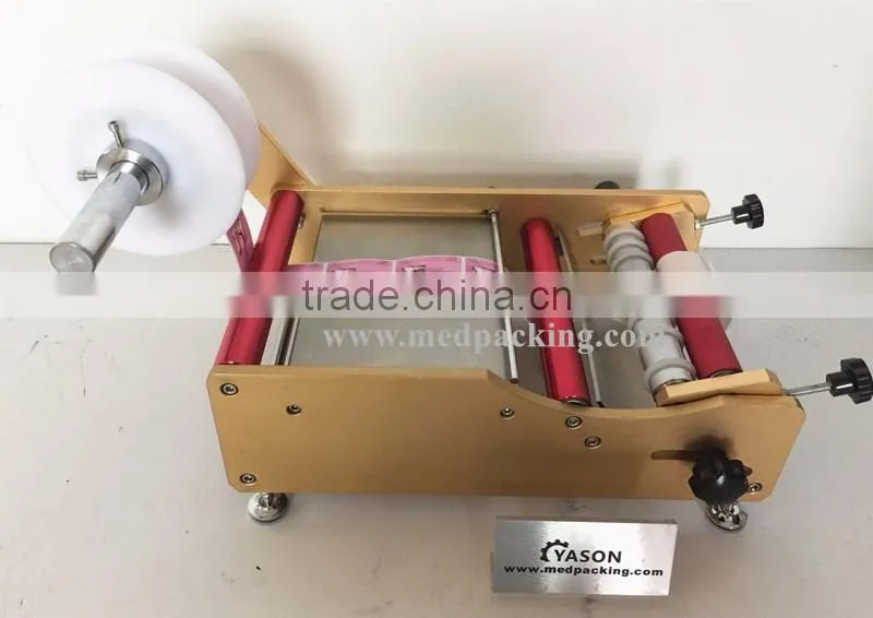 YS-L100 Manual Round Bottle Labeling Machine (25-50 pc/min)