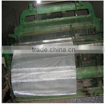 shuttleless weaving machineJG