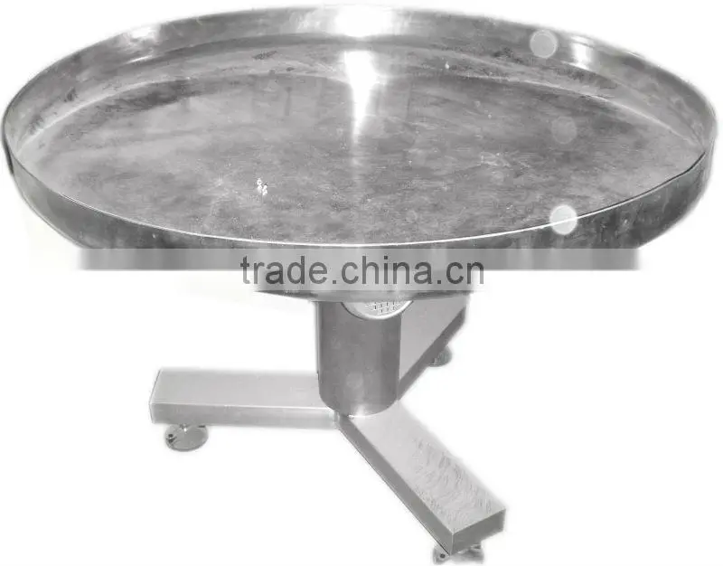 Unscrambling table in packing machine/collection table packing machines