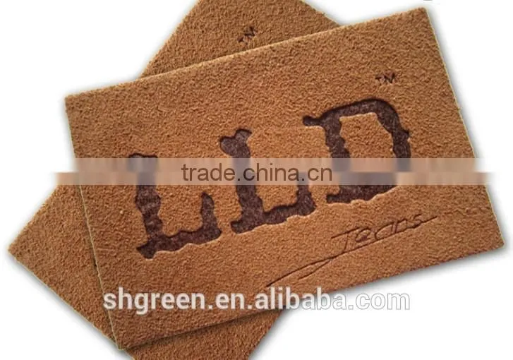 Dark brown irregular false leather label for pants
