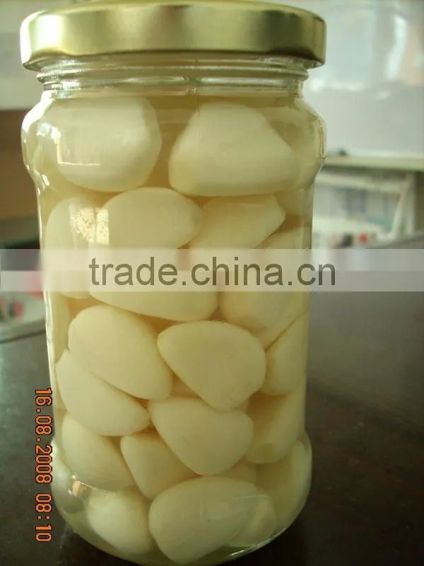 Garlic Cloves In Brine In Glass Jar