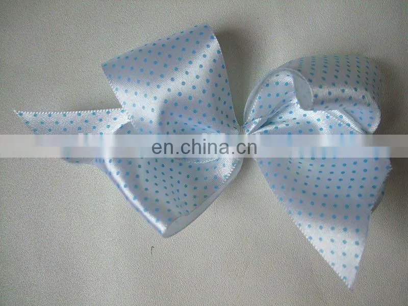 white bow tie for hair with spot