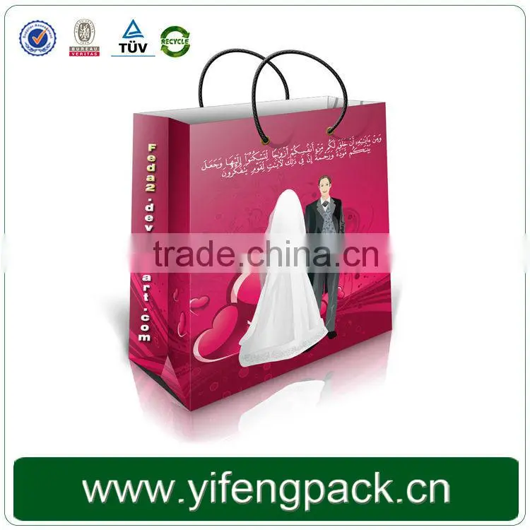 Full colors printing art paper fancy cheap luxury garment paper bag