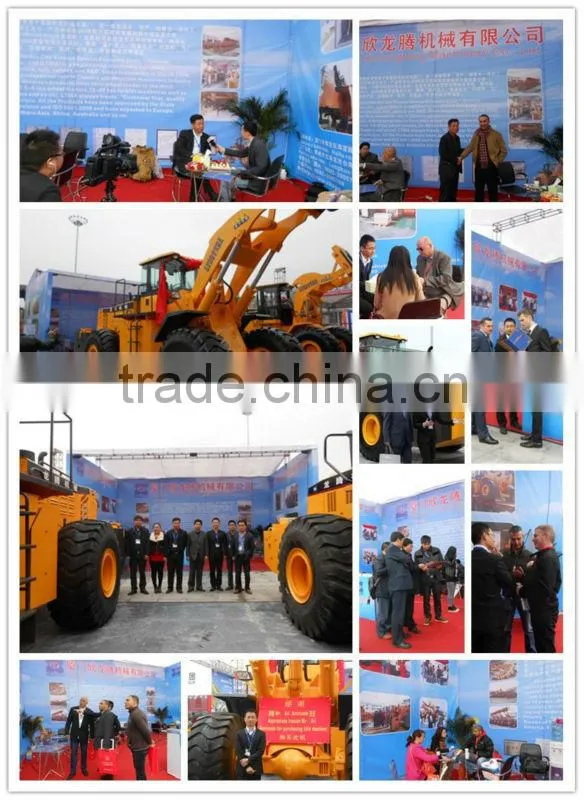 LTMA grass wheel loader with log grapple