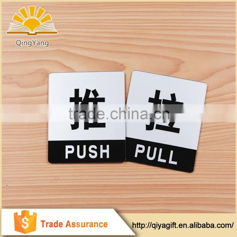 Plastic push pull door sign with adhesive on the back