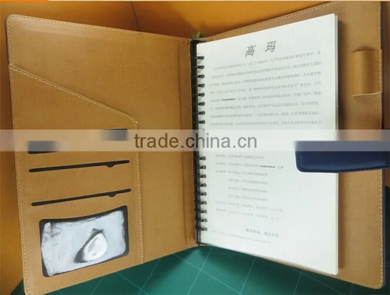 High quality promotional gift blue embossing pull up leather spiral notepad with pockets, pen holder and magnetic closure