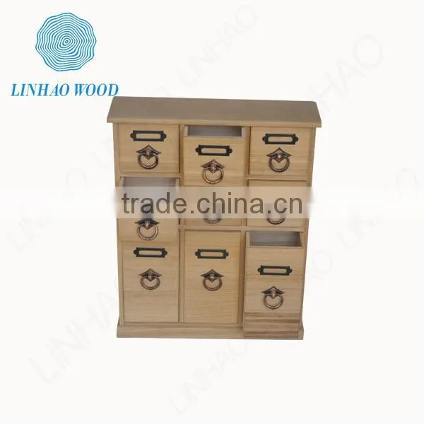 Wooden tea box with drawers