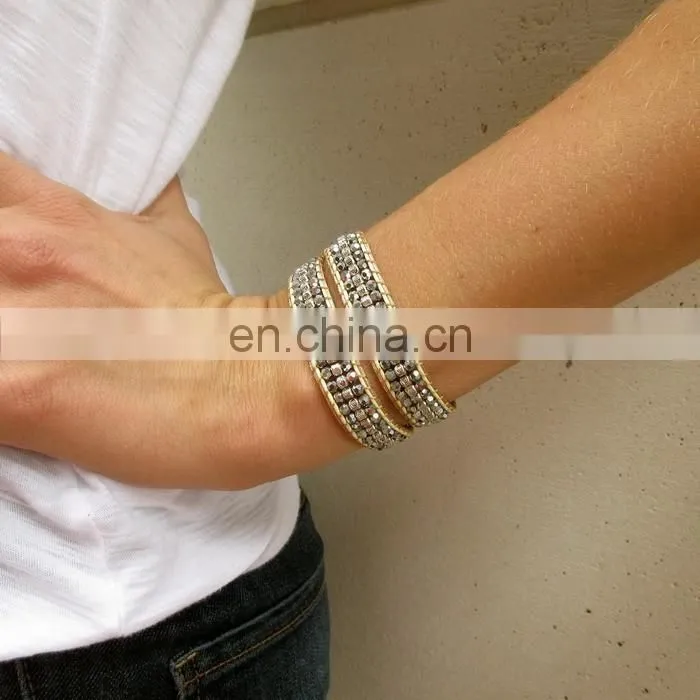 Handmade beaded wrap bracelet features 3 rows of circular and square stones surrounded by a natural colored cord on both sides