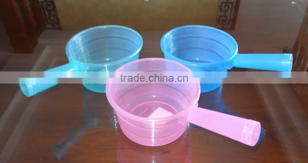 Clear plastic water ladle or soup ladle