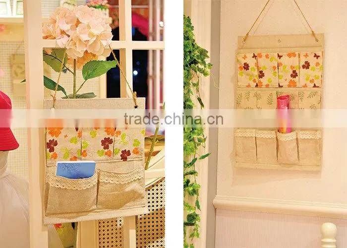 flowered fabric clothes peg storage bag is made of cotton