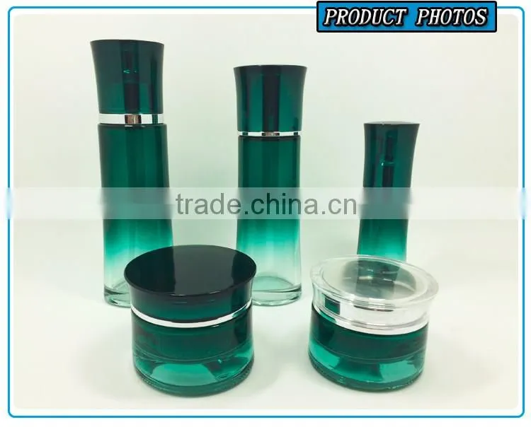 Green coloured cosmetic glass bottle and cosmetic glass jar