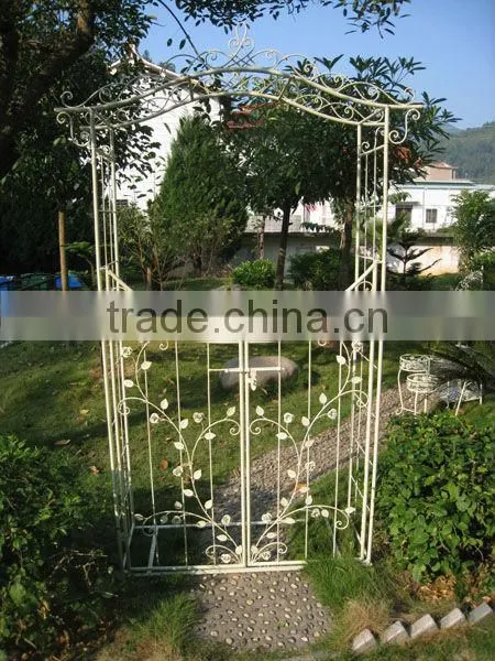 Metal artistic garden arch with bench for outdoor wedding