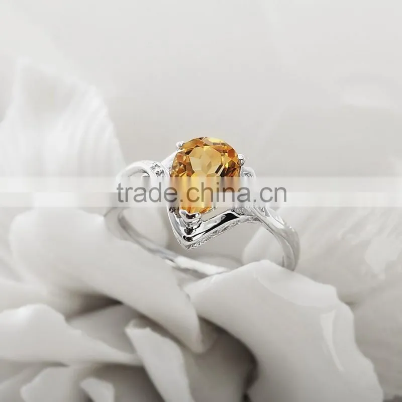Charming pear shape citrine stone with 925 sterling silver ring. Beautiful 925 sterling silver gemstone ring