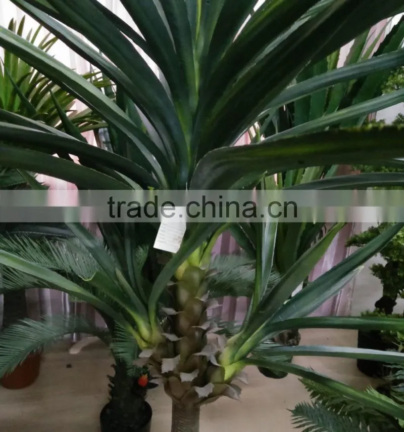 artificial green plant with flower for decoration