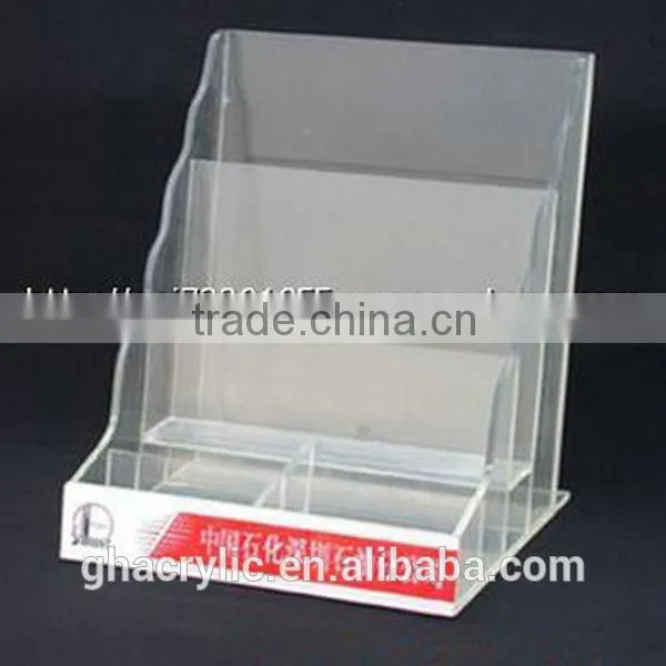 acrylic paper organizer at cardboard in display rack