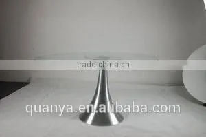 Round glass table with stainless steel base