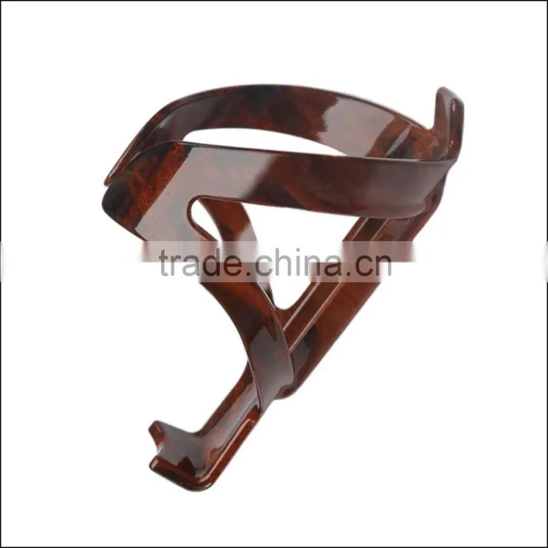 Production Wholesale mountain road bike cycling water bottle cage cup holder peach wood engineering materials PC Bottle Cage