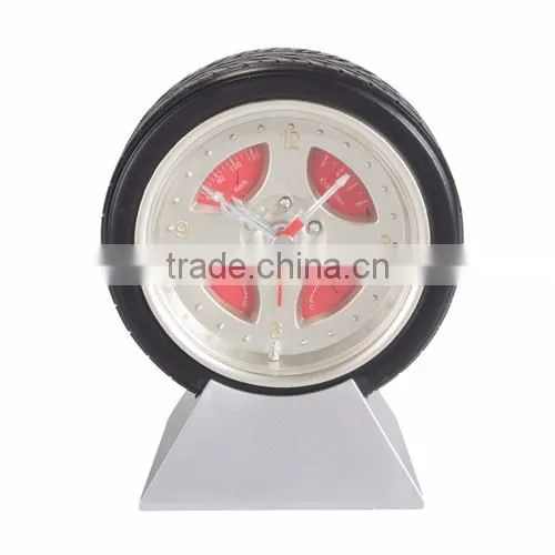 wheel shaped analogue table clock with matal base
