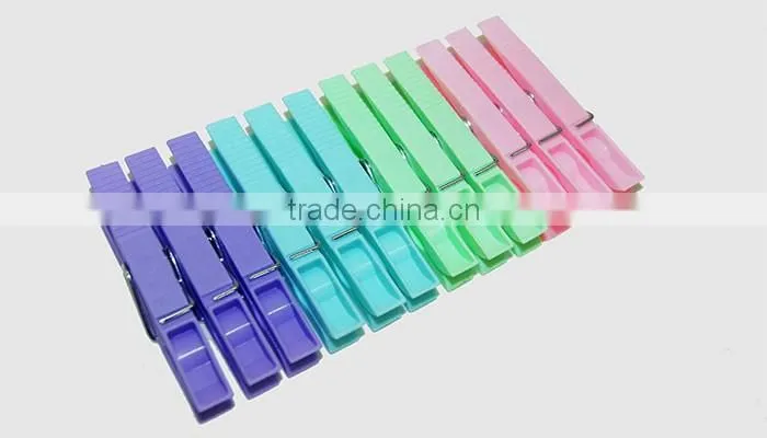 used household items hanging colored plastic peg for cloths