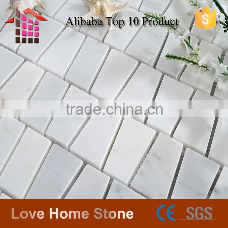 Carrara white mosaic tile, trapezoid tile backsplash