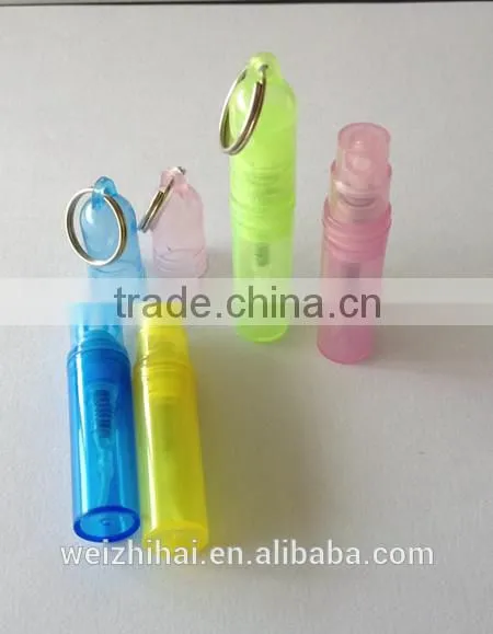 Small plastic empty perfume bottle