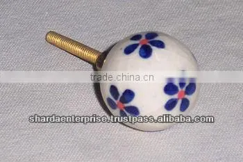 ceramic white knob with green circles