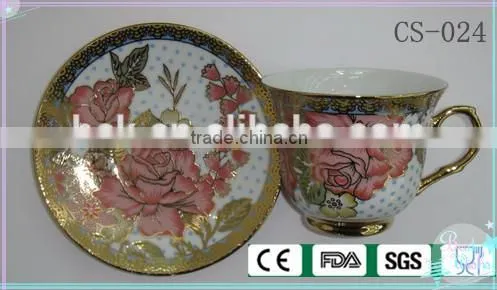 colored cafe tea cup and saucer