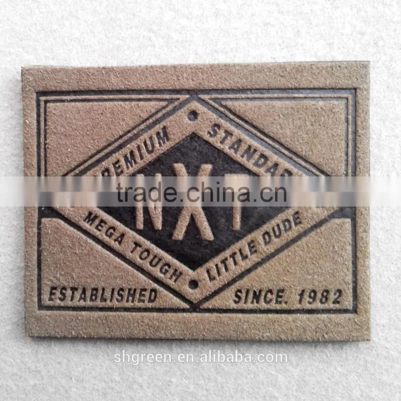 Embossed bear logo leather label for suits