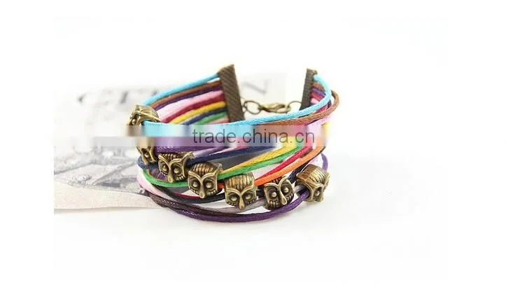 >>hot selling cute promotional colorful multi strands cord owl bracelet/