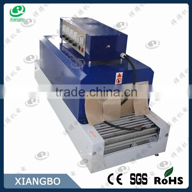 Automatic heating shrink wrapping packing machine