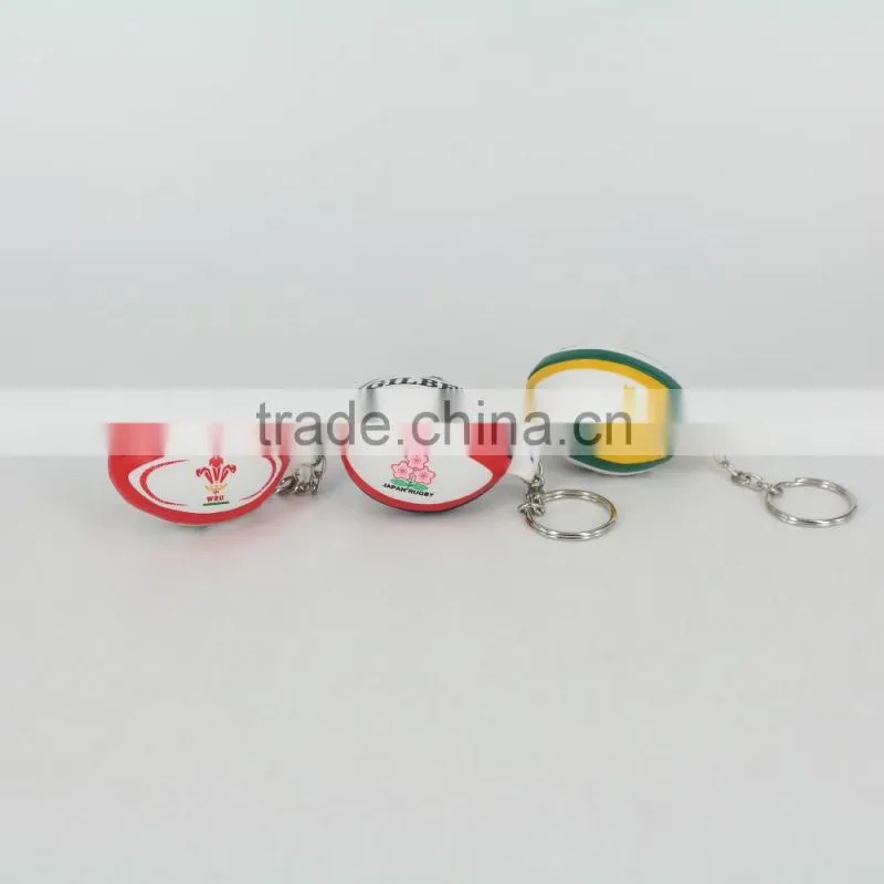 Promotion cheap cute rugby ball keychain,2016 promotional pu mini rugby ball stress ball keychain