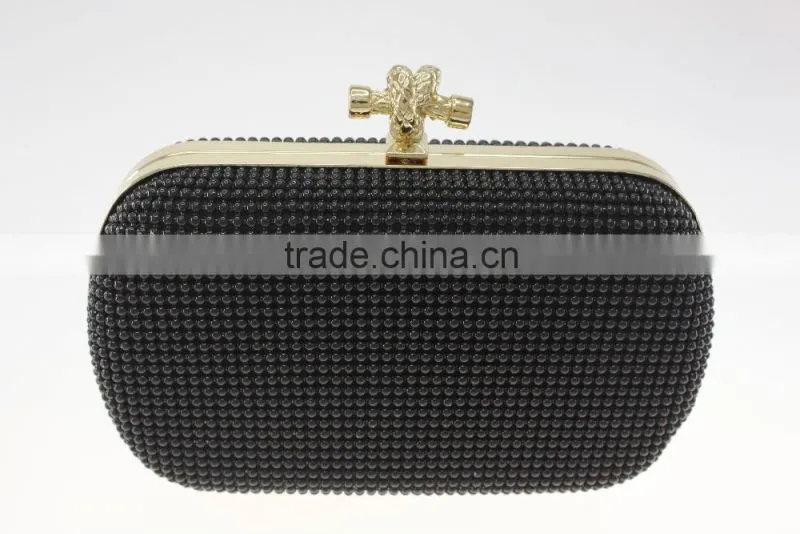 black cross shaped clasp clutch bag with mesh aluminum available color