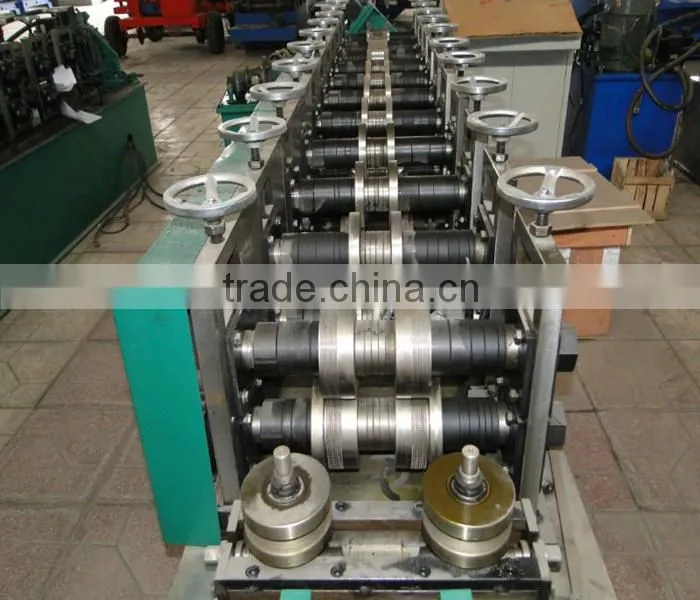 Gutter making machine and downspout roll forming machine