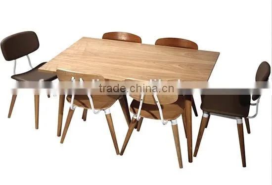 blue fabric upholstered dining room chair with leather