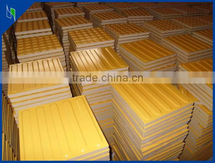 yellow tactile flooring tile