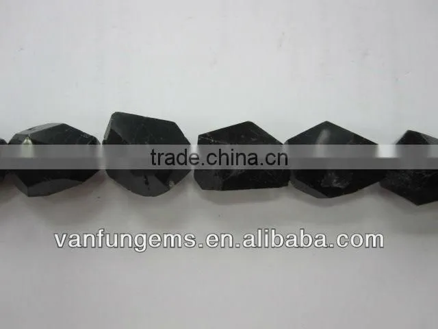 Black tourmaline faceted tumble stone