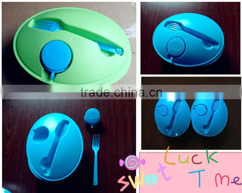 plastic round salad bowl with fork
