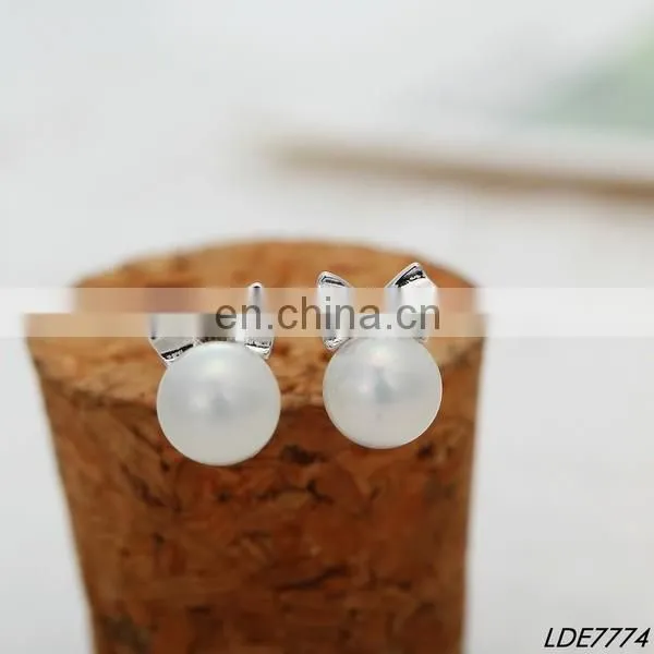 Gold ear tops designs hot wholesale chic gold delicate diamante flower bridesmaid wedding double sided pearl stud earrings