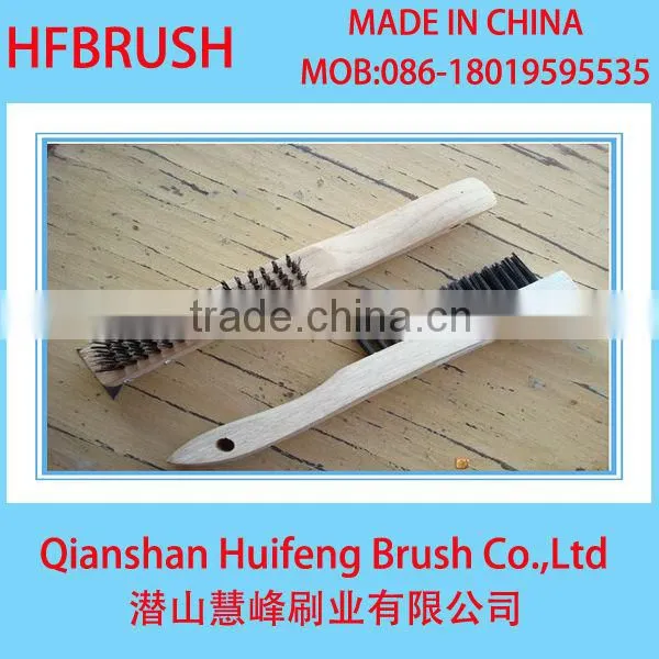 Wooden handle brush with metal wire