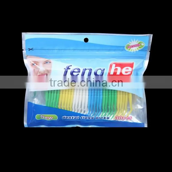 High quality plastic green and white Y shape dental floss pick