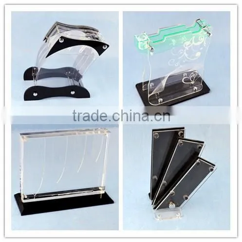 clear acrlyic knife rack with black base