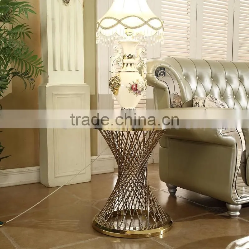 Modern gold wire side table with round manmade marble