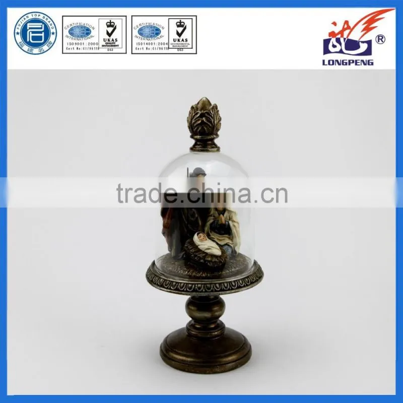 Regal Holy Family with Decorative Glass Hurricane and Bronze-Look Finial and Pedestal Base