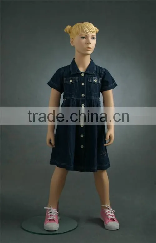 Christmas window display dress up realistic children mannequins