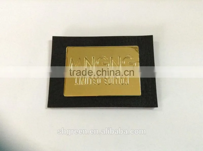 Promotional white real leather label with engraved logo metal plate