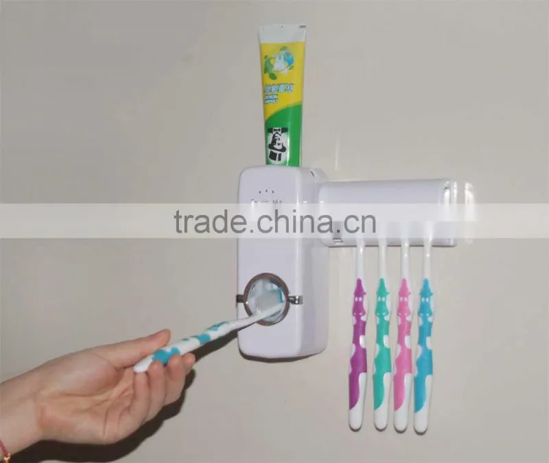 Wholesale children automatic toothpast dispenser toothbrush that dispenses with brush holder bathroom set