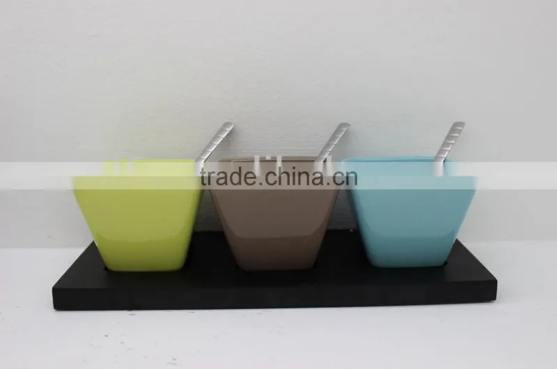 Colorful wooden snack tray with ceramic bowl and stainless steel spoon