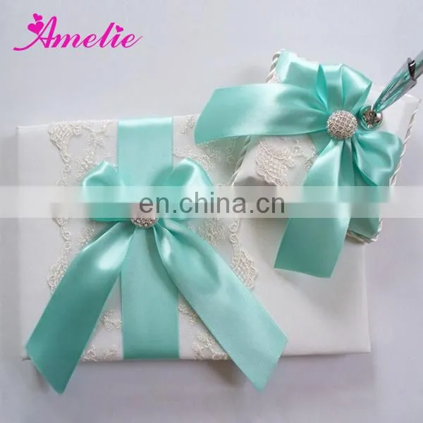 AW0707 Feather, pearls and rhinestones decorated ivory guest book