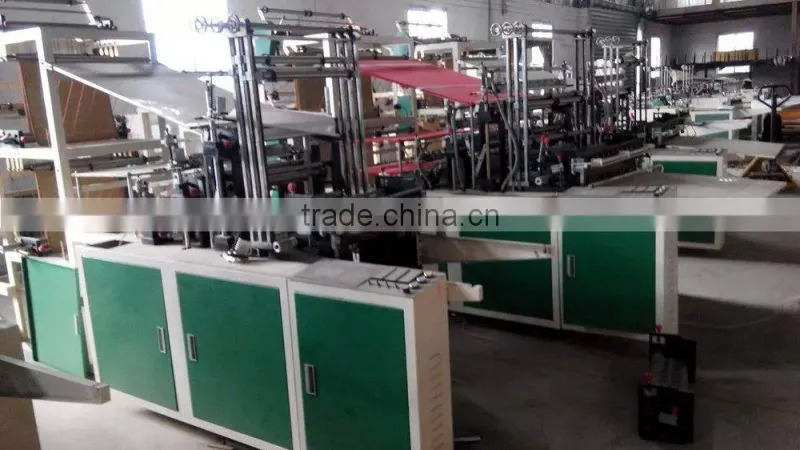 China Hot Sale Automatic Double Layer Point Cut Rolling Bag Making Machine